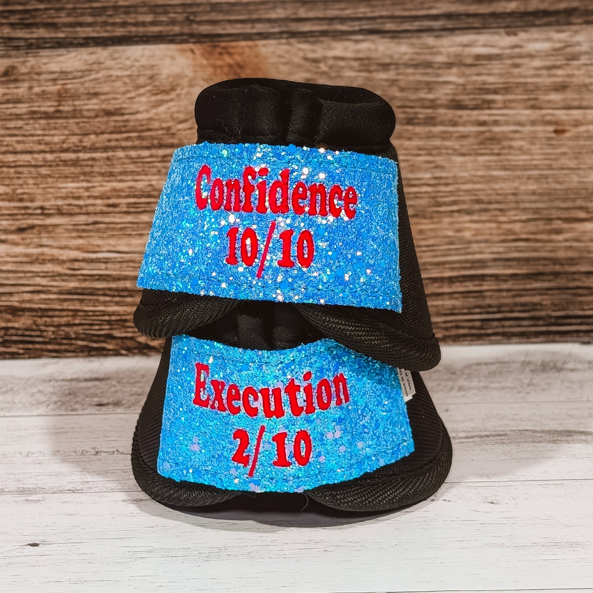 Medium Black "Confidence vs Execution" Bells w/ Light Blue Glitter Straps