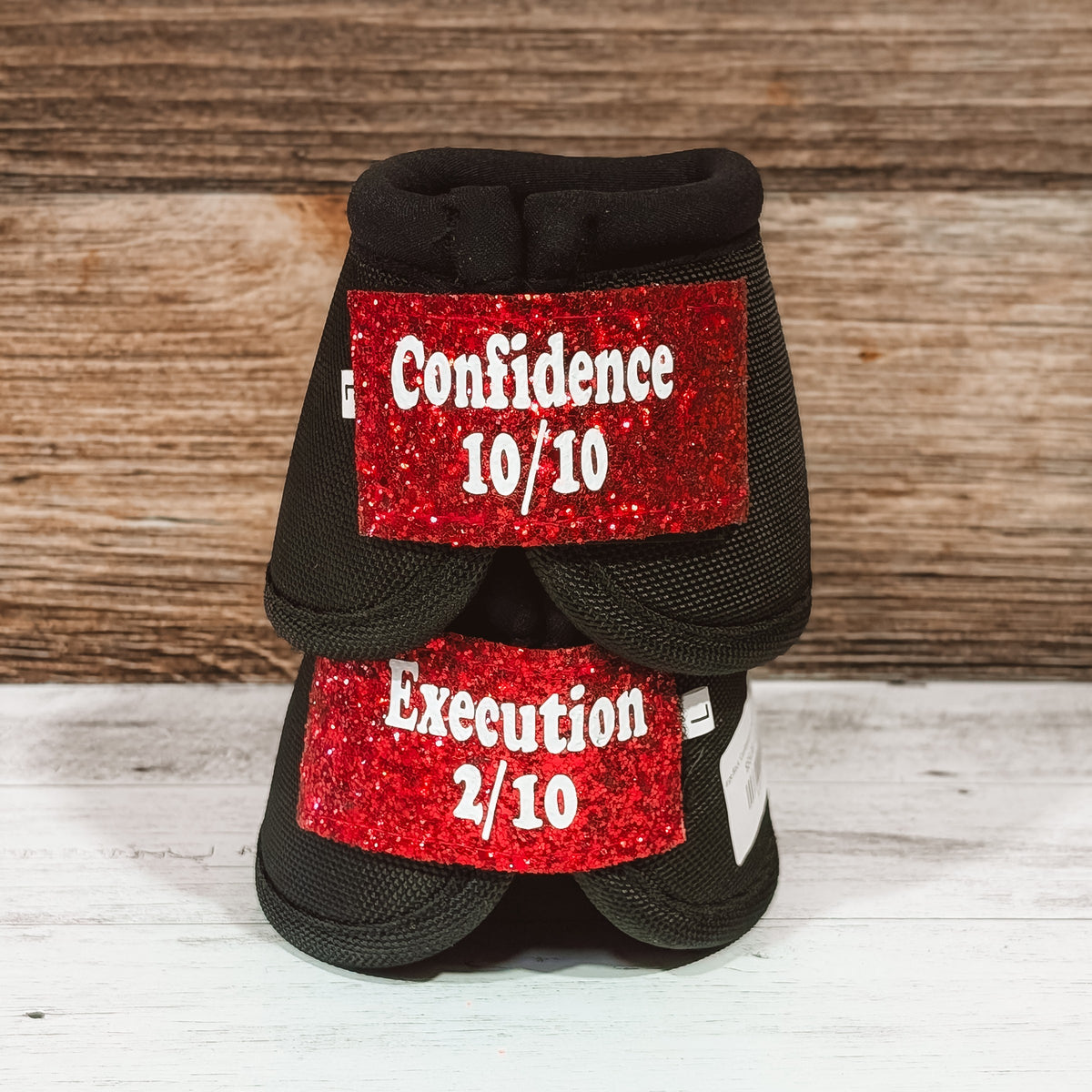 Large Black "Confidence vs Execution" Bells w/ Red Glitter Straps