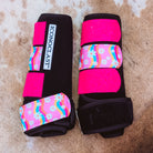 Large black Iconoclast front boots with hot pink glitter straps and rainbow daisy print straps