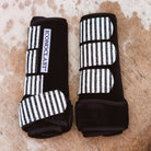 Medium black Iconoclast front boots with black and white striped glitter straps