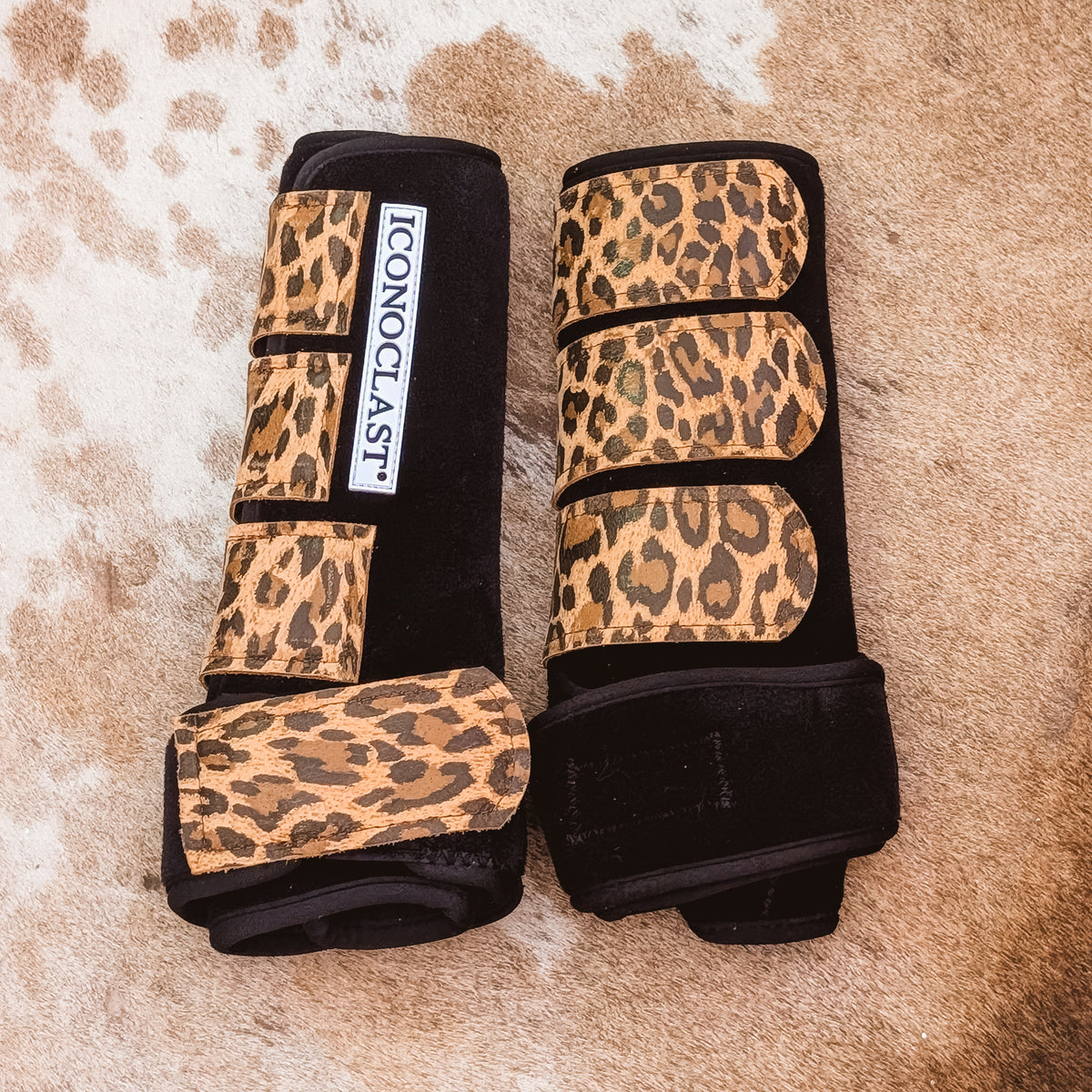 Medium black Iconoclast front boots with cheetah print leather straps