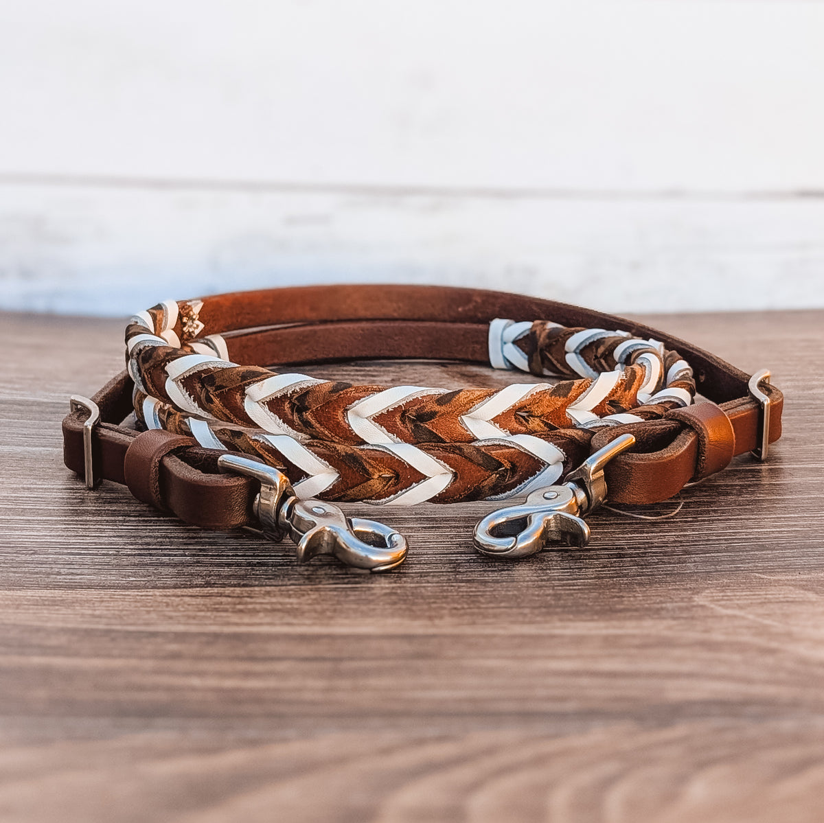 White and cheetah double laced barrel reins